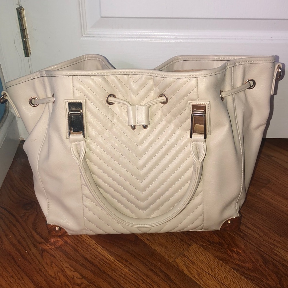 Cream Pocket Book comes with Strap